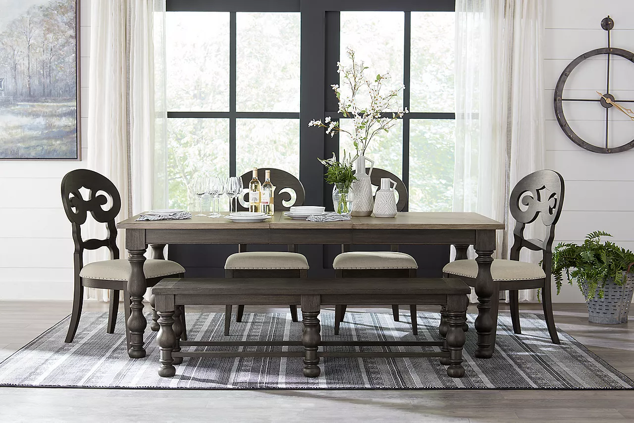 Barrington Dining Table in Antique Oak/Matte Black and Scroll Side Chairs and Bench in Matte Black in a room scene.